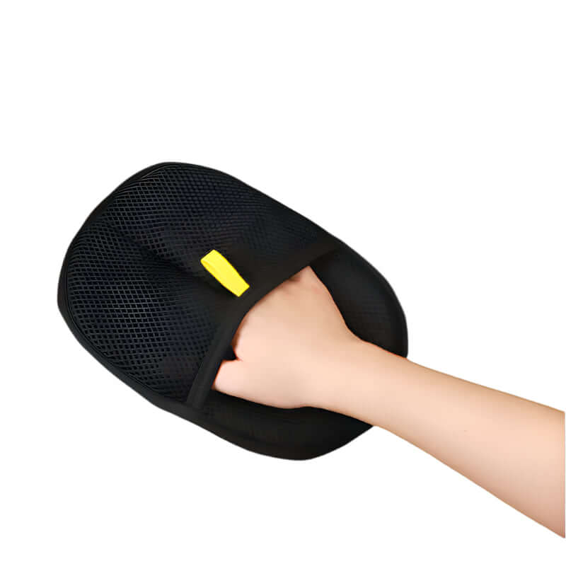 Static-charged PawGlide glove removing hair from soft surfaces in one motion