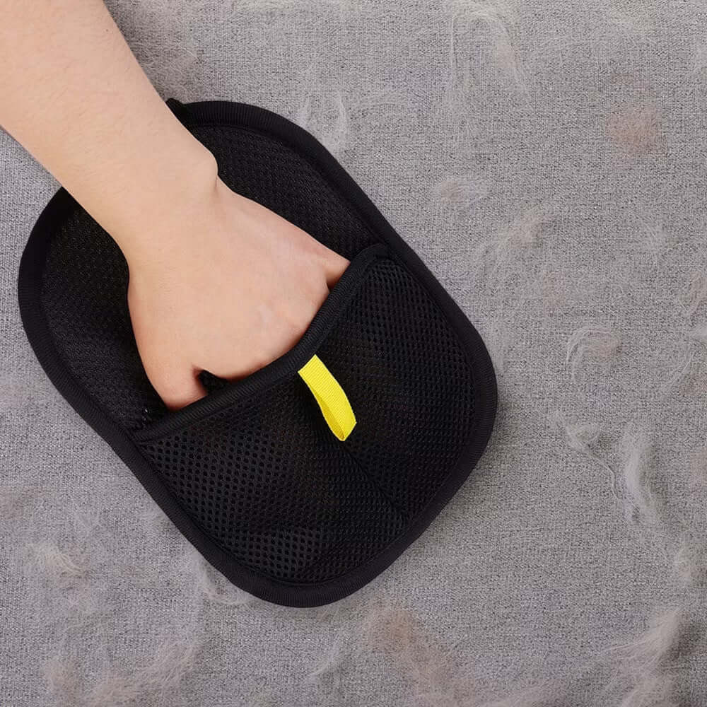 PawGlide glove removing pet hair from cat tree with a single swipe