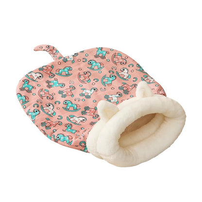 Pink patterned cat sleeping bag with a cream-colored opening