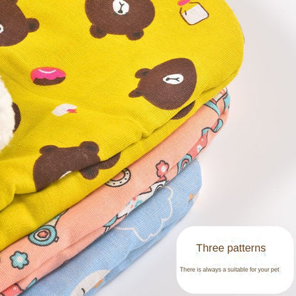 Close-up of yellow patterned cat sleeping bag fabric and trim