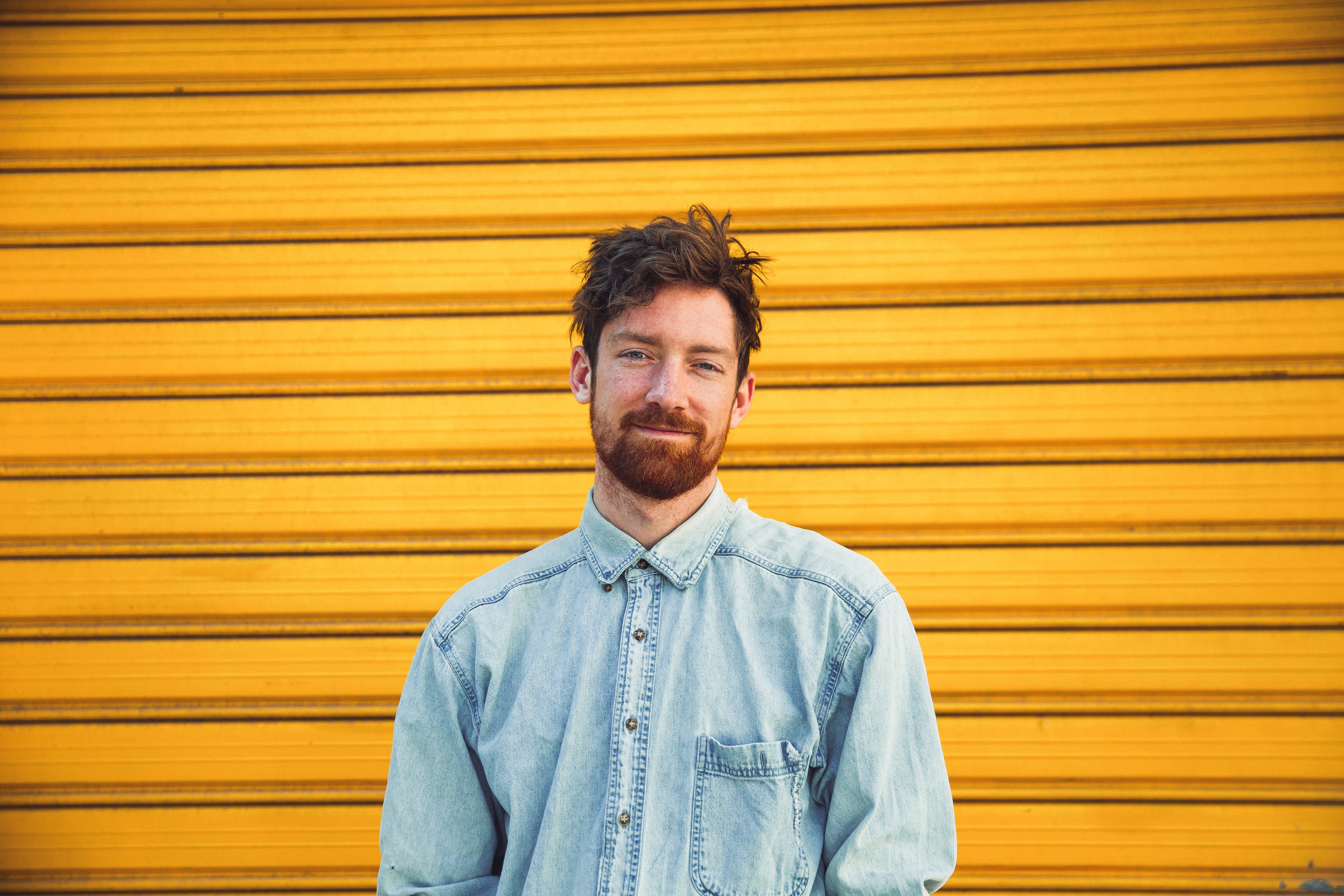 files/smiling-man-and-yellow-door.jpg